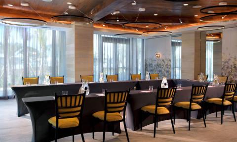 The image shows a stylish and modern dining area