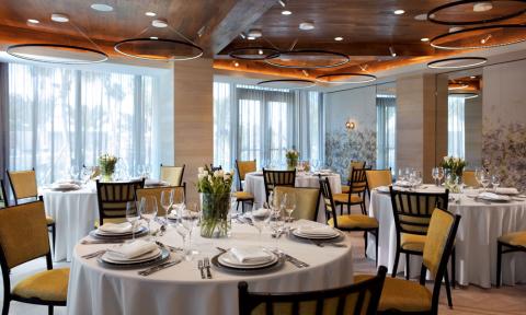 This image shows a sophisticated dining room, likely in an upscale restaurant or hotel