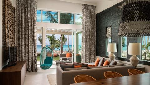 This image shows a stylishly decorated beachfront living room