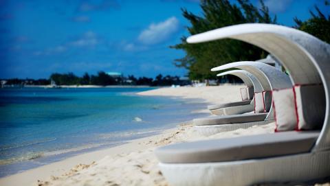 Oceanfront day beds on Seven Mile Beach