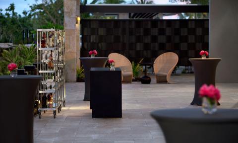 This image shows an outdoor setup for an event, possibly a reception or gathering