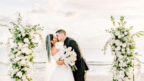 bride and groom at altar