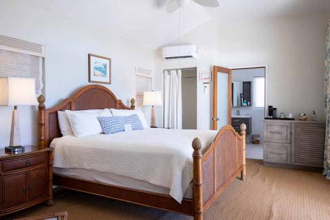 The image depicts a well-furnished bedroom