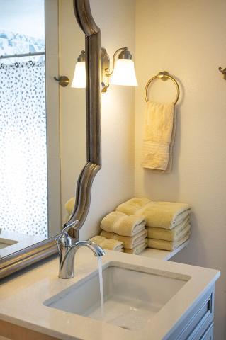 The image shows a bathroom sink area