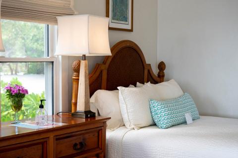 The image shows a beautifully decorated bedroom