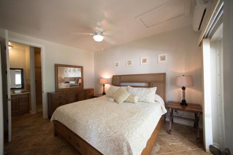 The image shows a neatly arranged bedroom