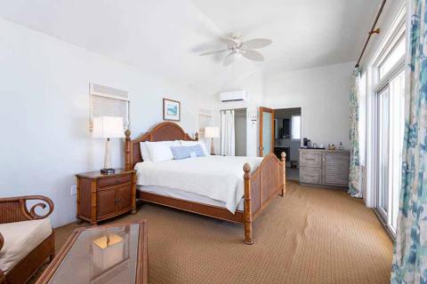 The image shows a well-furnished bedroom