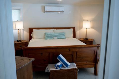 This image depicts a neatly arranged bedroom