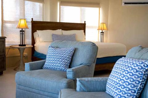This image depicts a warm and inviting bedroom setting