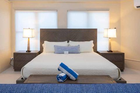 This image shows a beautifully arranged modern bedroom