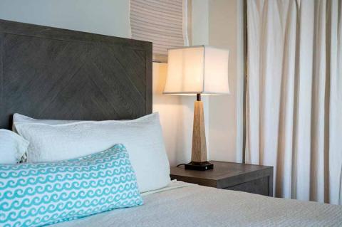 This image shows a part of a nicely decorated bedroom