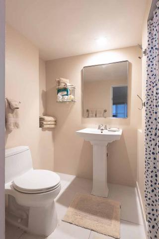 This image shows a small, neatly arranged bathroom
