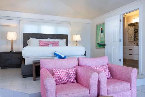 This image shows the interior of a well-appointed bedroom