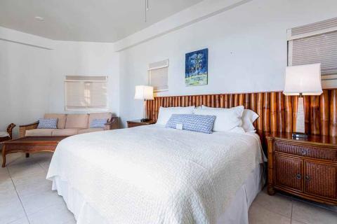 The image shows a neatly arranged bedroom
