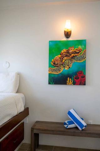 The image shows a part of a room with bright, natural decor