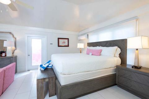 This image features a neatly arranged bedroom