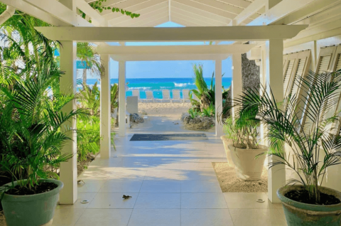 This image features a beautiful beachfront pathway