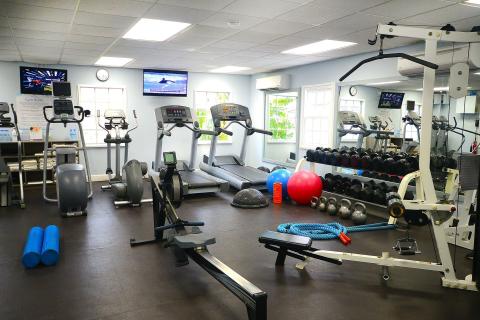 This image shows the interior of a well-equipped gym