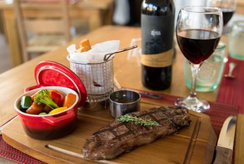 This image features a meal set on a wooden table