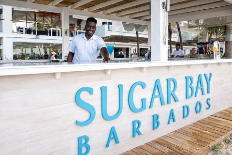 The image shows an outdoor bar setting