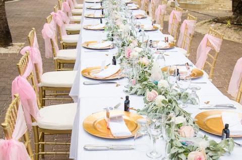 This image shows a beautifully arranged outdoor dining setup