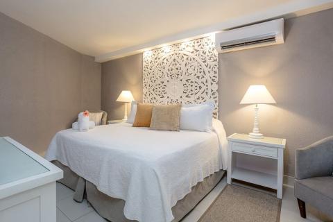 This image depicts a neatly arranged bedroom
