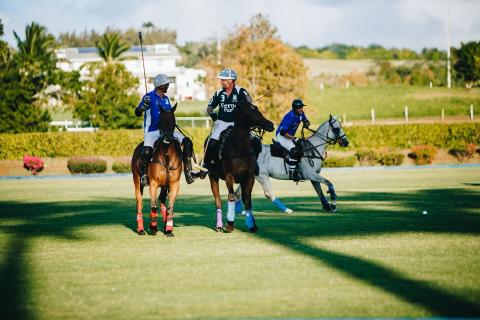 This image depicts a scene from a polo match