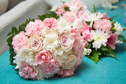 This image shows a beautiful floral arrangement featuring a mix of pink and white flowers