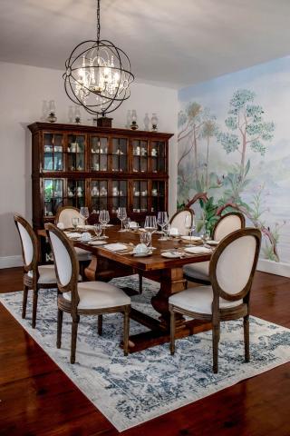 The image shows a beautifully arranged dining room