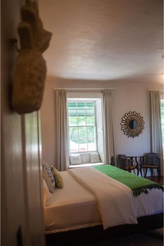 The image shows a cozy bedroom