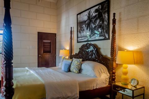 This image shows a warmly lit bedroom