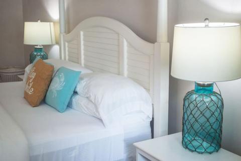 This image features a neatly arranged bedroom setting