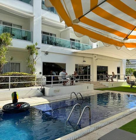 This image features an outdoor area of a modern hotel or resort