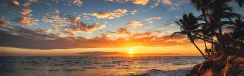 This image depicts a mesmerizing sunset over the ocean